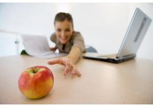 reaching for an apple